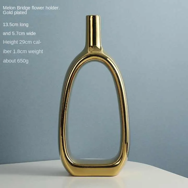 الشمال السيراميك مزهرية لتزيين المنزل الحلي الذهبي الفضة الأبيض السيراميك الفن المزهريات . Nordic Ceramic Vase Home Decoration Ornaments Gold