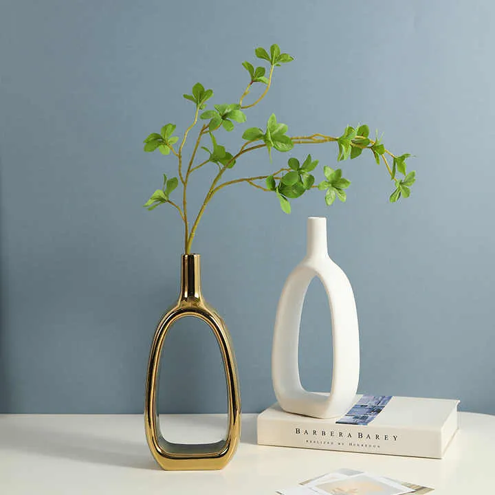 الشمال السيراميك مزهرية لتزيين المنزل الحلي الذهبي الفضة الأبيض السيراميك الفن المزهريات . Nordic Ceramic Vase Home Decoration Ornaments Gold
