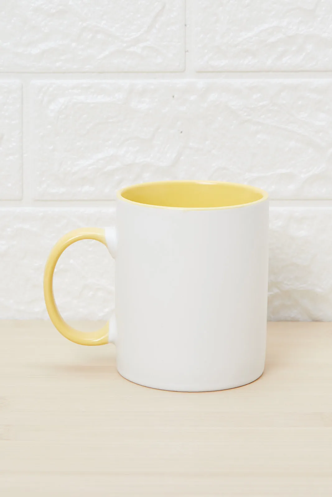 Yellow And White Coffee Mug